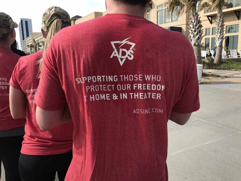 Backside of ADS Run T-shirt for Mission Give Back