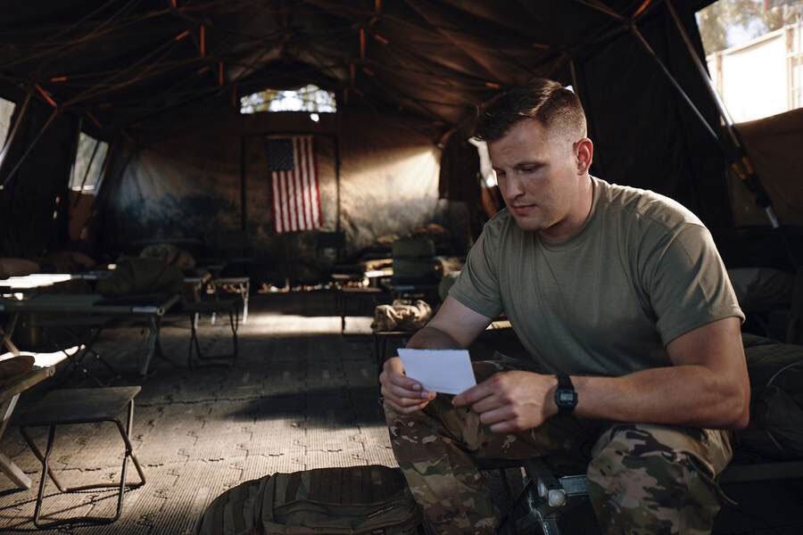 Military Man Reading a Letter