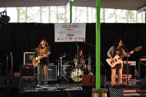 People Performing at The Band Aid Music Festival
