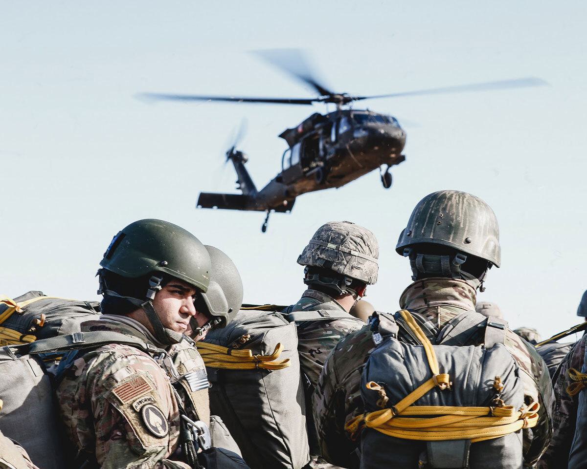 Army soldiers by landing helicopter
