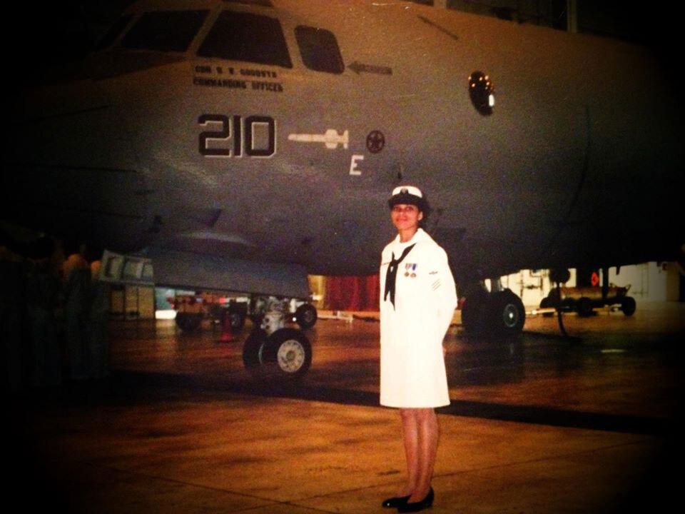 Quawnishia Morgan Posing in Front of Aeroplane