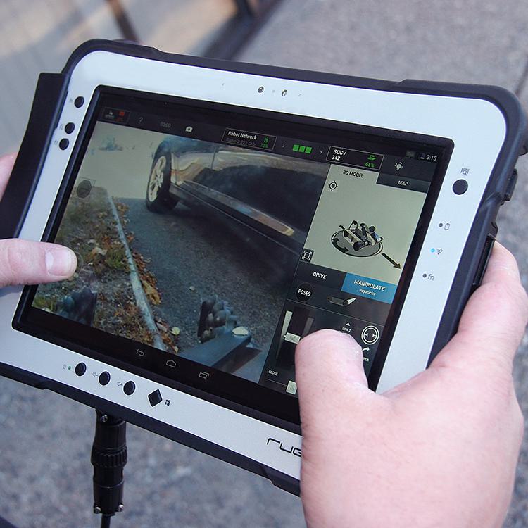 Hands Controlling FLIR SUGV