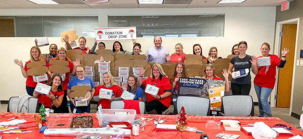 People Posing With a Large Shipment from Troopster of Care Packages